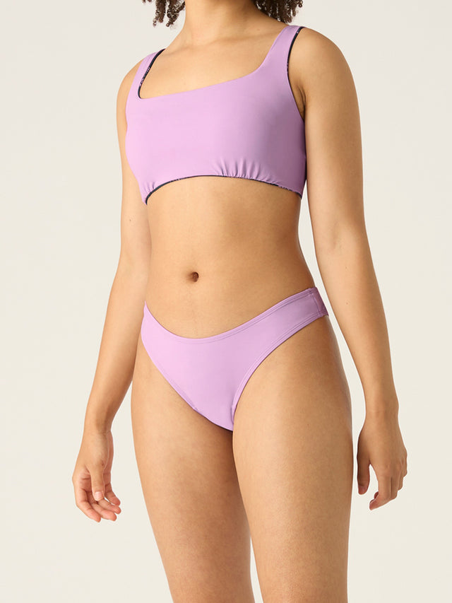 SWSTCRNAMTLW-MB_Recycled Swimwear_Reversible Crop Top_Midnight Tropic PrintLavender-3_model_Gabby_16-XL.jpg